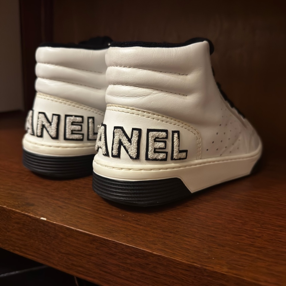 CHANEL Cream and Black High-Top Sneakers